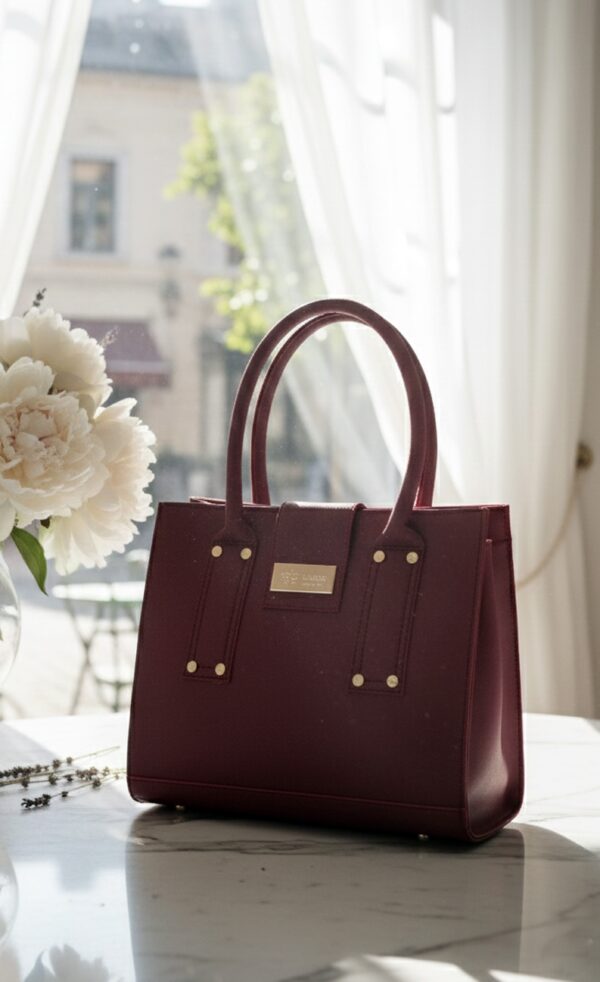 maroon structured handbag