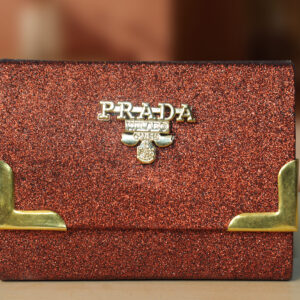 shiny dark red color clutch